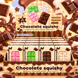 Chocolate Sprinkle Squishy 12Stk im Verkaufsdisplay mit bunten Schokoladen-Squishys in Braun, Pink, Grün und Weiß mit Streuseln.